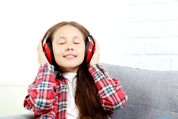 Portrait of girl with headphones  - Photo, Image