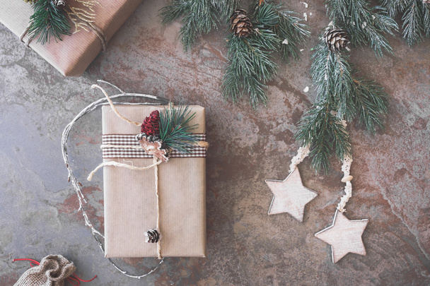 Christmas present in brown paper  - Valokuva, kuva