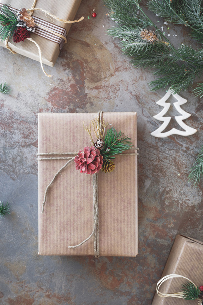Christmas presents on rustic background - Φωτογραφία, εικόνα