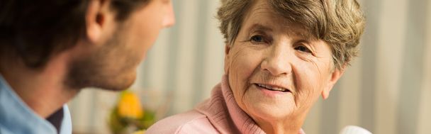 Patient talking with carer - Photo, Image