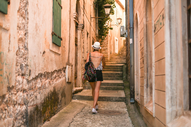 Girl on walk in old town - Photo, Image