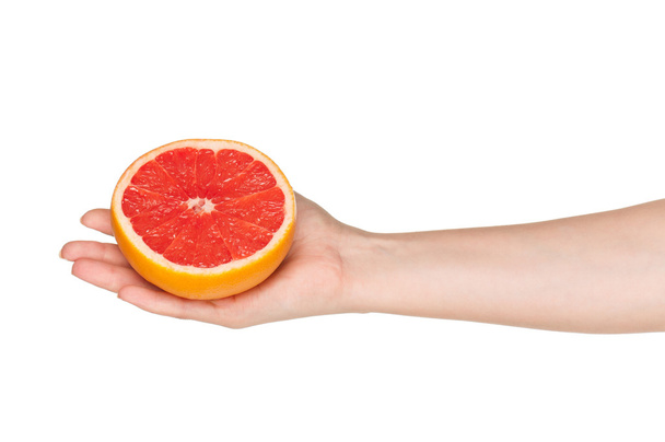 Рука с грейпфрутом
 - Фото, изображение