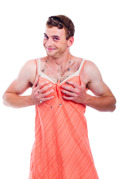 Трансвестит тримає груди
 - Фото, зображення