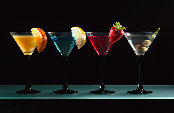 Different cocktails garnished with fruits - Photo, Image