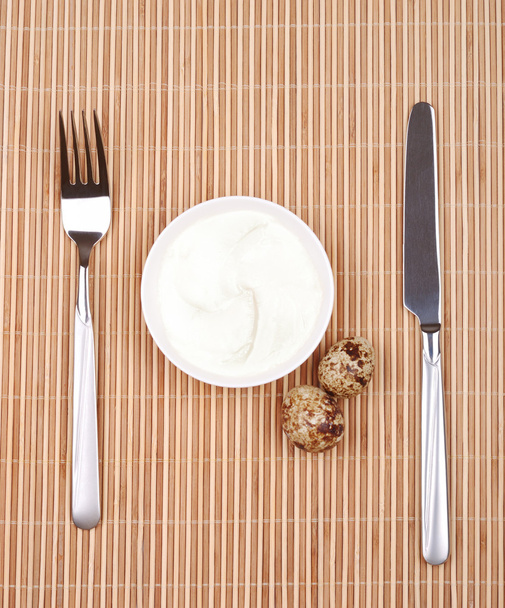 Mayonnaise in a saucer and quail eggs - Photo, Image