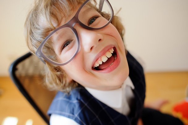 Little cheerful schoolboy. - Photo, Image