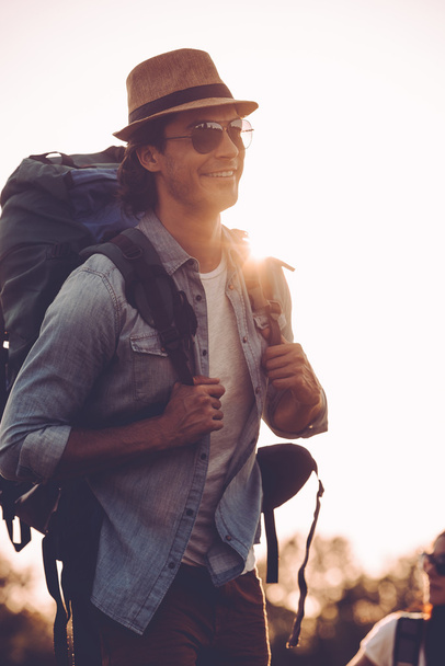 man in fedora carrying backpack  - Photo, Image