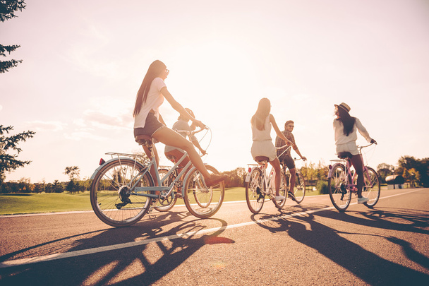young people riding bicycles  - 写真・画像