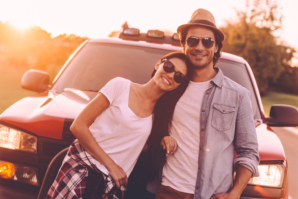 couple  leaning at their pick-up truck  - 写真・画像