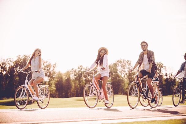  young people riding bicycles - Fotó, kép