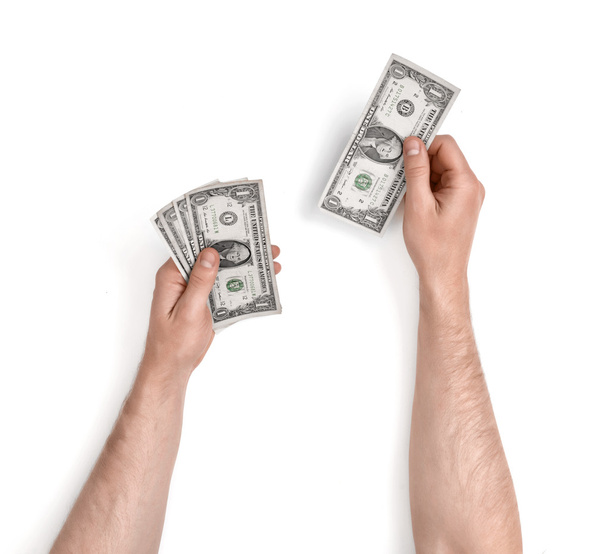mans hands counting dollar bills - Foto, Imagem