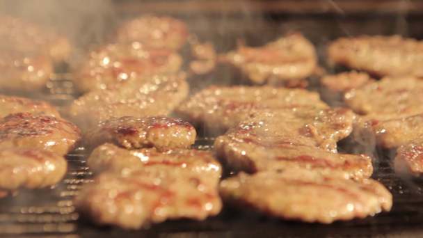 Barbecue grliling shish kebab and meatballs - Footage, Video
