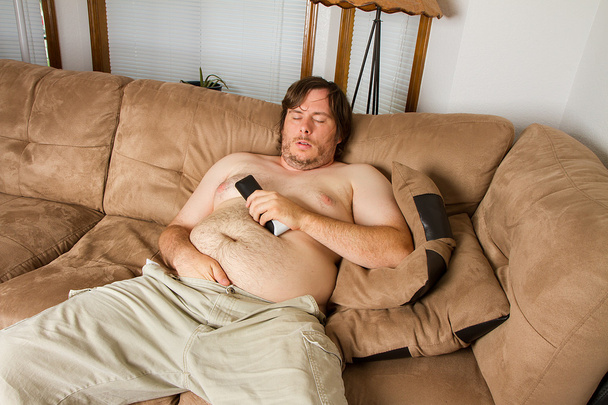 Толстяк спит на диване.
 - Фото, изображение