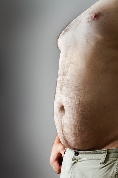 Man with large belly exposed - Photo, Image