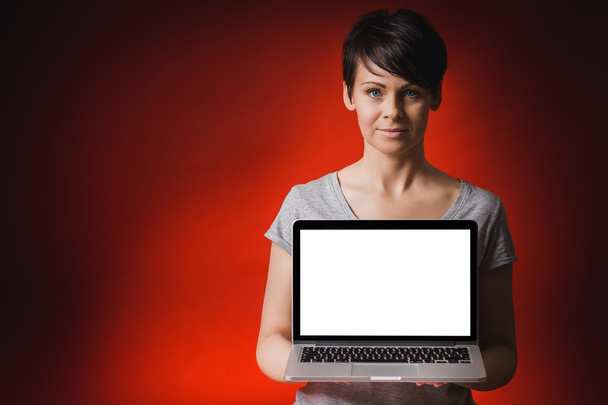 woman presents computer screen - Photo, Image