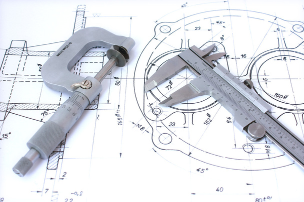 Micrometer and caliper on blueprint - Photo, Image