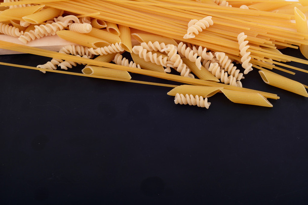 dry pasta with blackboard. - Photo, Image
