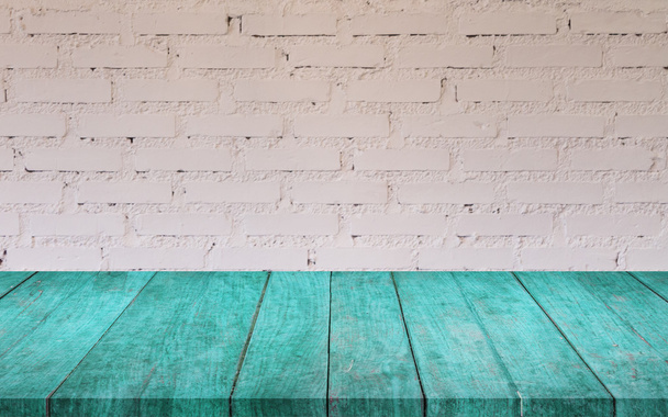 Blue wooden table top with white brick wall - Photo, Image