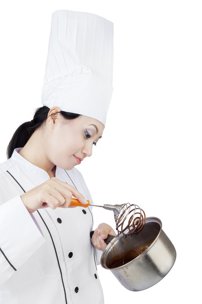 Female chef cooking chocolate - Фото, зображення