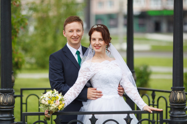 Young happy bride and groom on their wedding - Photo, image