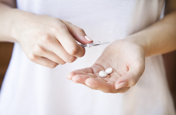 Pills in women's hands - Photo, Image