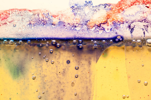 Abstract composition with mix of oil, water and colorful ink with bubbles - Fotografie, Obrázek