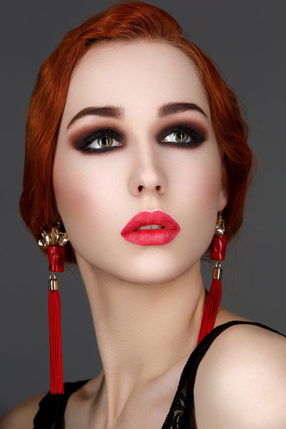 Beautiful girl with smoky eyes and red lips - Zdjęcie, obraz
