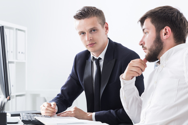 Two men getting ready to negotiations with colleagues from other company. Concept of business competition - Foto, Imagem