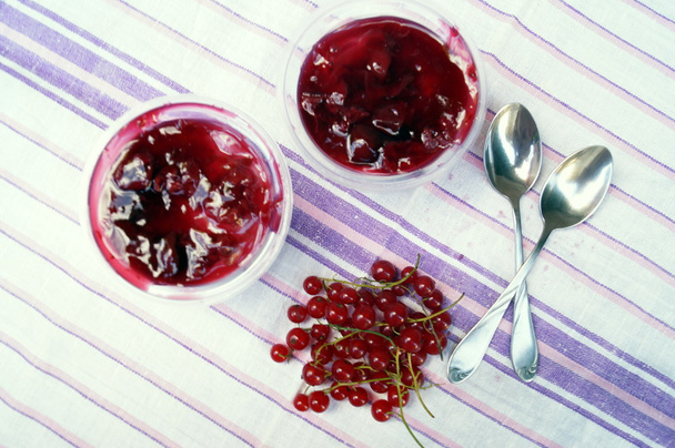Parfait dessert with berries, milk souffle and jello layers. Treat in a glass. - Fotó, kép