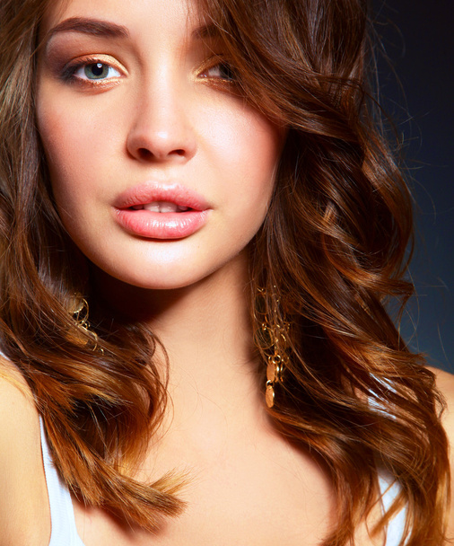 Close up portrait of beautiful young woman face. - 写真・画像