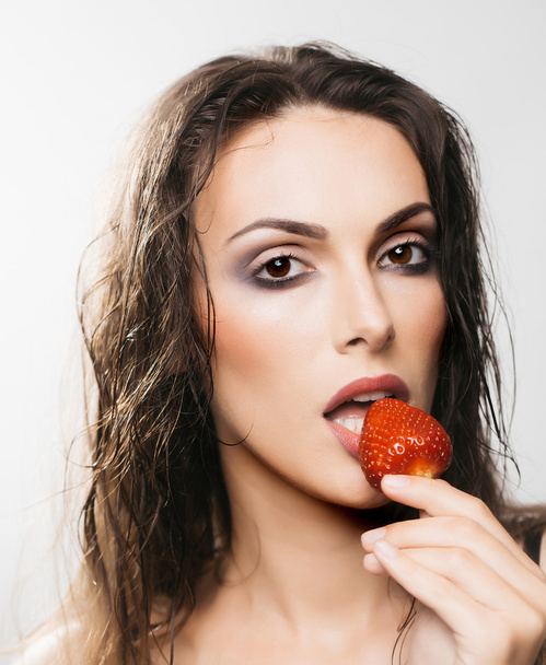 sexy pretty woman with red strawberry - Foto, Imagem