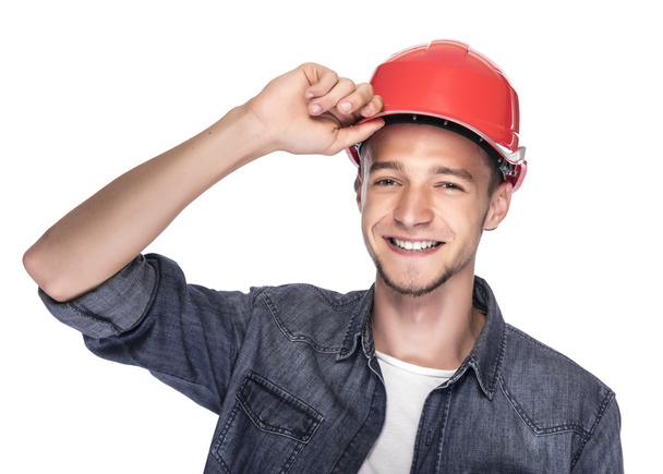 Young man in a construction helmet. - Photo, Image