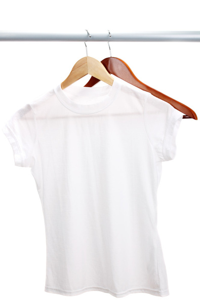 White t-shirt on hanger isolated on white - Foto, Bild