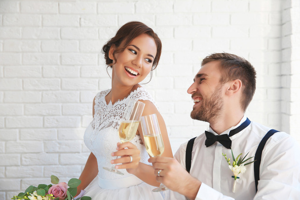 Groom and bride with glasses  - Valokuva, kuva
