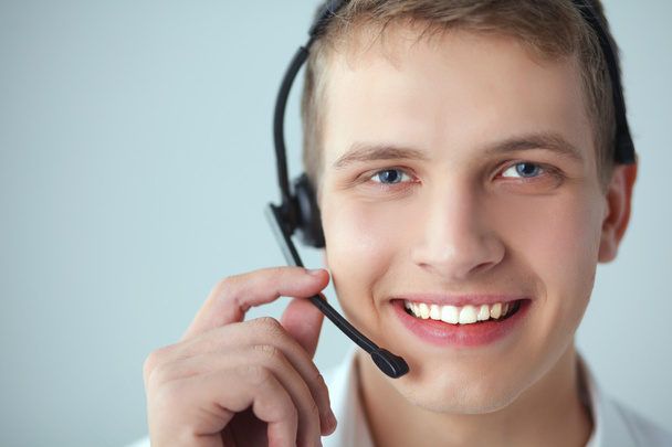 Customer Support Operator mit Headset auf weißem Hintergrund - Foto, Bild