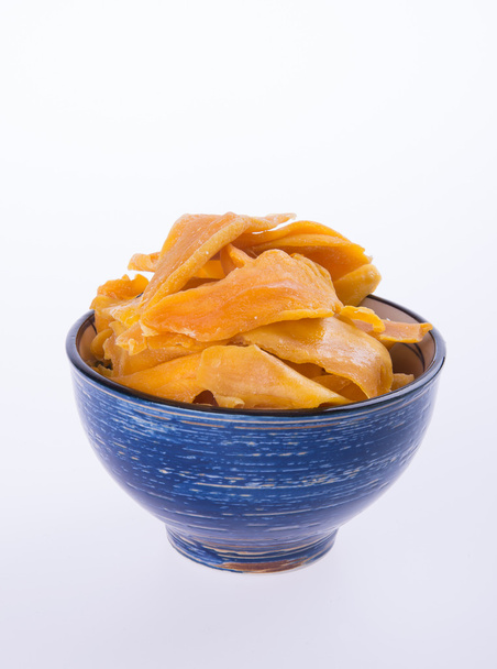 mango dry in bowl or dried mango slices. - Zdjęcie, obraz