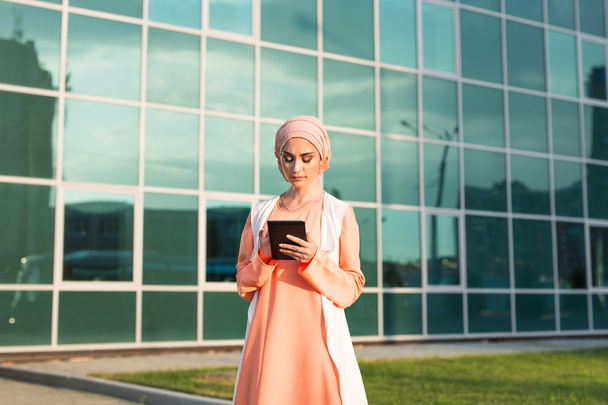 modern Arabian woman with tablet computer - Фото, изображение