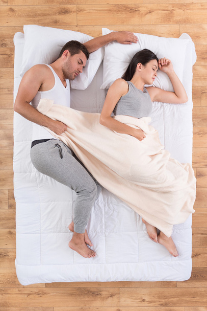 Nice couple sleeping on bed - Foto, Imagem