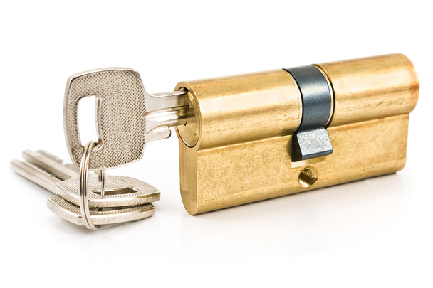 Patronenzylinder aus Messing mit Schlüsseln - Foto, Bild