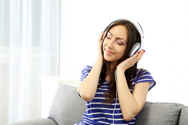 Young woman in headphones  - Photo, Image