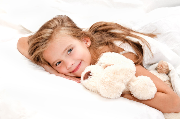 Adorable smiling little girl waked  - Foto, afbeelding