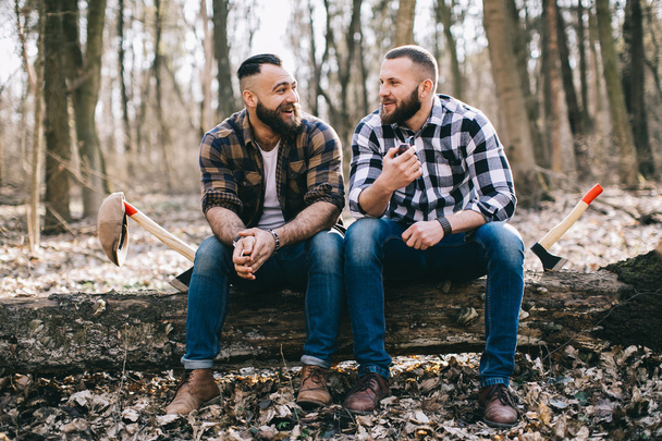 bearded men in a forest - Foto, Bild