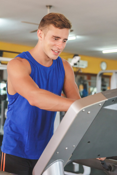 man on treadmill at gym - Photo, image
