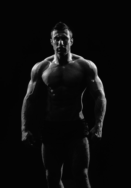 lihaksikas urheilullinen mies
  - Valokuva, kuva