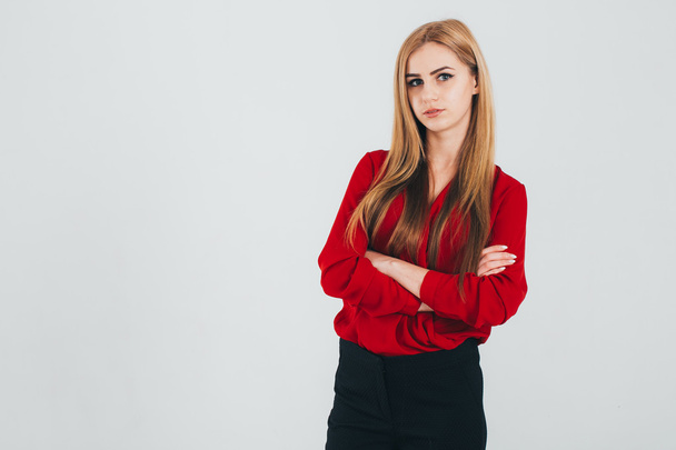 Serious girl in red shirt - Foto, afbeelding
