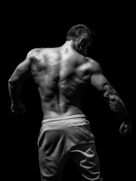 Muscular male model bodybuilder  - Zdjęcie, obraz