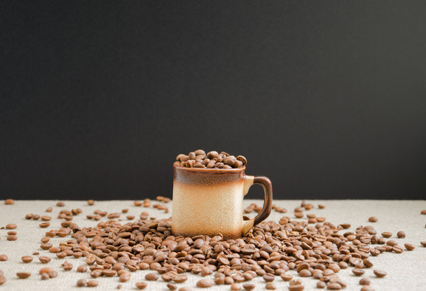 Cup with coffee beans - Foto, imagen