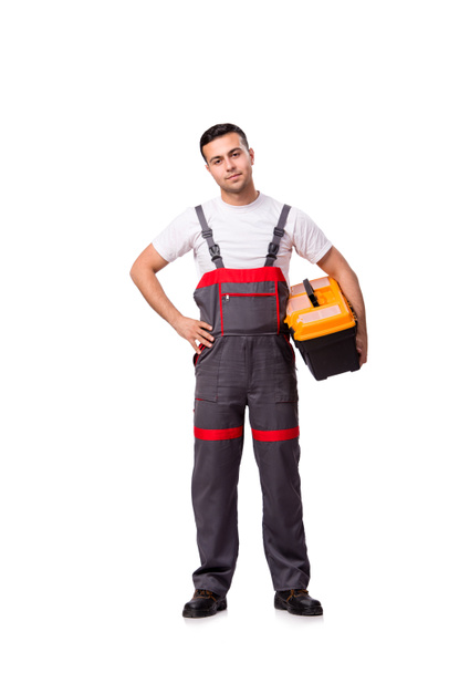 Νεαρός άνδρας με toolbox κιτ εργαλείων που απομονώνονται σε λευκό - Φωτογραφία, εικόνα