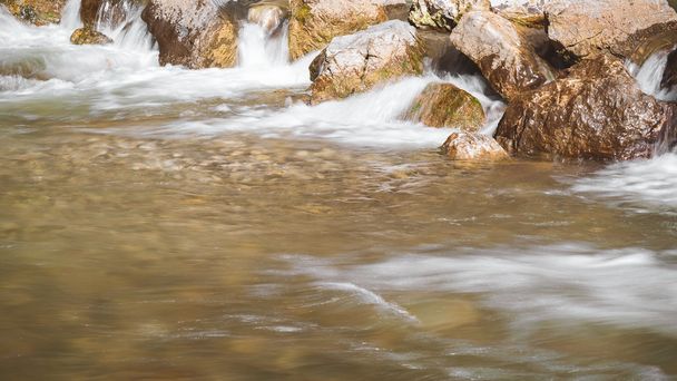 Rocks in river - Фото, изображение