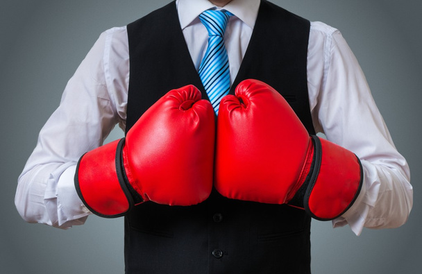 Businessman or box manager in fighting pose. - 写真・画像